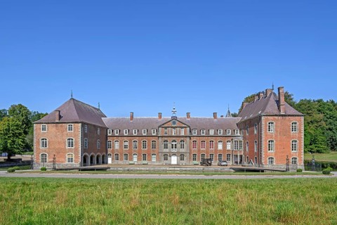 16th century Classicist Château de Franc-Waret in Louis XV style, moated castle in the village