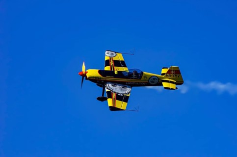 A Votec 351 sport aircraft from the Swiss MSW Aviation AG with registration HB-YMV during a flight
