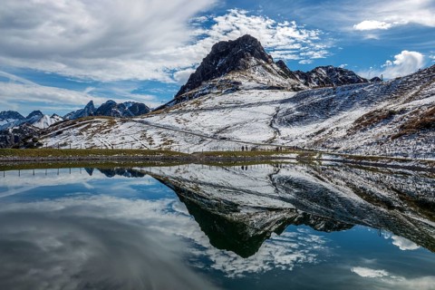 Kanzelwand is reflected in the reservoir, Kanzelwand snow-making pond, mountains of the Allgäu Alps