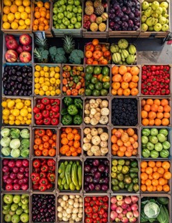 Fresh fruits and vegetables in a market display, aerial view perpendicular top down, healthy eating