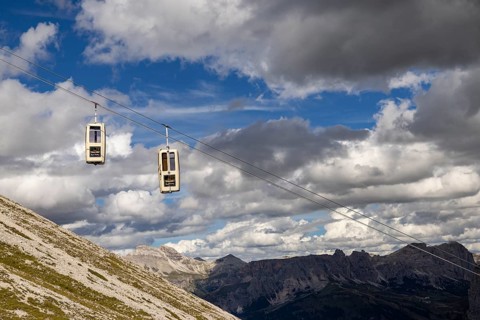 Cabins of the gondola lift to the Sassolungo Valley, Dolomites, Trentino, South Tyrol, Italy