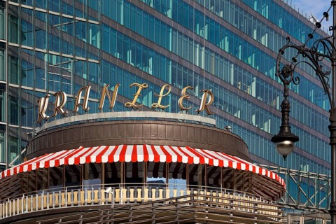 Café Kranzler with historic lantern and modern office building on Kurfürstendamm, Charlottenburg,
