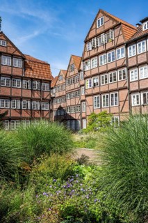 Facades of the historic brick buildings, inner courtyard, view over the city, Peterstraße,