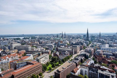 City view, view over the city with church towers and town hall tower, from the tower of St