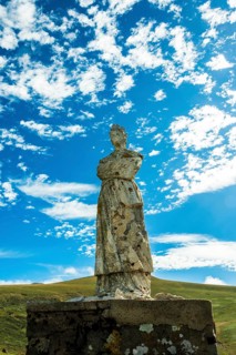 Statue of Virgin Mary. Roc de Courlande in Auvergne Volcanoes Regional Park. Puy de Dome. Auvergne