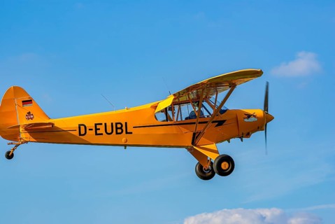 A Piper PA-18 Super Cub of the Bravo Lima Formation during a flight demonstration as part of an air