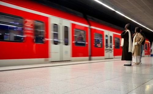 Underground arriving S-Bahn, train, class 420 in traffic red, platform, stop, Stadtmitte station,