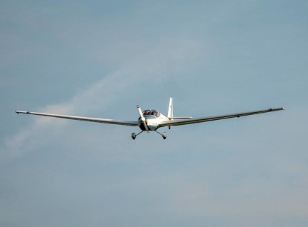 SF-25C Rotax Falke disc motor glider flying over Düsseldorf Airport, North Rhine-Westphalia,