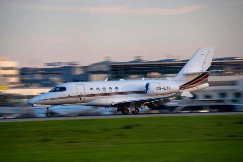 Private jet of the type Cessna Citation Latitude, of the private airline NetJets, landing at