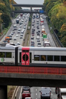 S-Bahn S28 crosses the A3 motorway between the Hilden junction and the Mettmann junction, view to