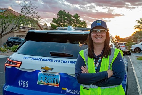 Las Vegas, Nevada - Devyn Choltko, a water waste investigator, patrols a residential neighborhood