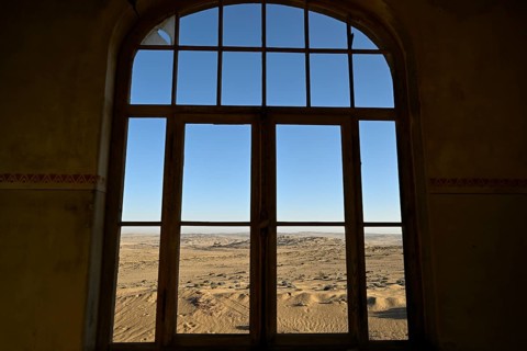 View from a former dwelling house into the desert, Kolmanskop, restricted diamond area, Karas