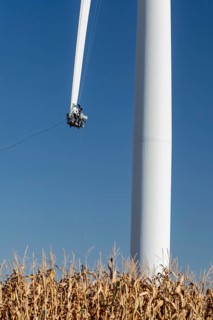 Luverne, Minnesota - Workers repair the cracked blade of a wind turbine