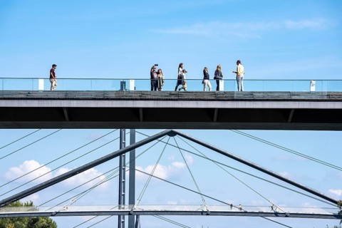 Bridges in Düsseldorf, in the foreground, the pedestrian and cycle bridge over the canal to the