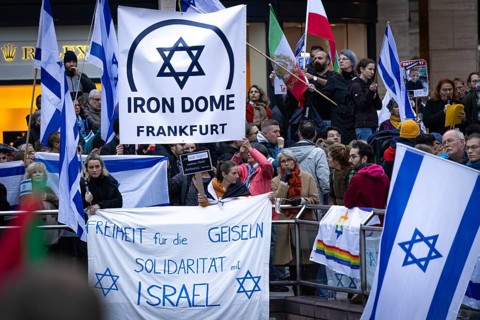 Numerous people gather for a vigil at the Hauptwache in Frankfurt am Main on the second anniversary
