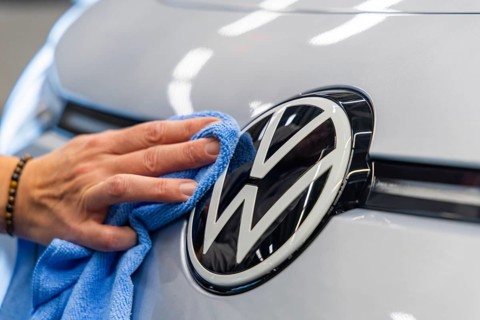 Electric car production in the assembly halls of VW in Zwickau. VW logo, Zwickau, Saxony, Germany