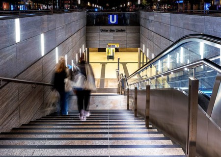 Night photo, long exposure with motion blur, modern underground entrance at Unter den Linden