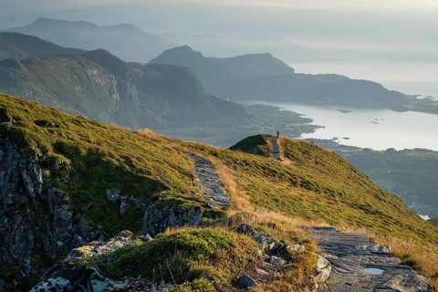 Hikers on Rørsethornet stone staircase, with 3292 steps one of the longest continuous stone