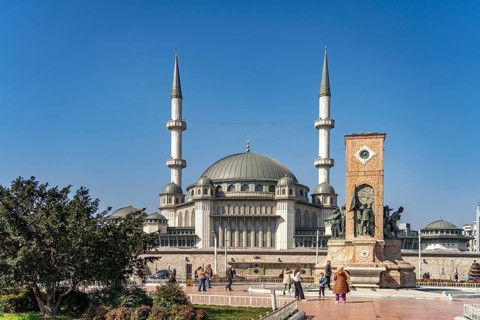 The Cumhuriyet Aniti Republic Monument and the Taksim Mosque on Taksim Square Taksim Meydani in