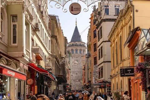 Shops, restaurants and the Galata Tower in Beyoglu, Istanbul, Turkey