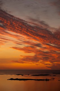 Offshore islands and skerries, sea, dramatically illuminated clouds, sunset, Otroya or Otrøya