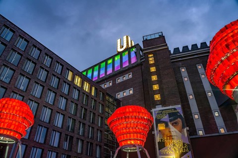 Illuminated sculptures of Dortmund roses in front of Dortmund's landmark U, Centre for Art and
