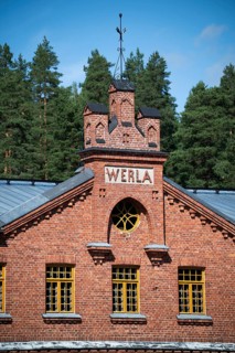 Brick façade with inscription Werla, former paper factory and mill for the production of groundwood
