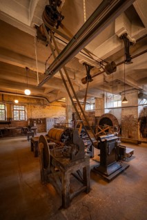 Factory hall with historical machines for the production of cardboard and paper, former paper