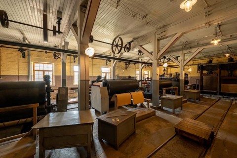 Factory hall with historical machines for the production of cardboard and paper, former paper