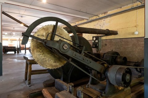 Large historic circular saw, former paper mill and mill for the production of groundwood pulp