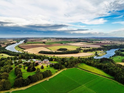 Paxton House over River Tweed from a drone, Paxton, Berwick-upon-Tweed, Berwickshire, Scotland, UK
