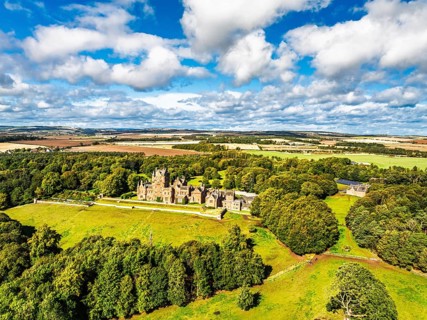 Ayton Castle from a drone, Ayton, Eyemouth, Scottish Borders, Scotland, UK