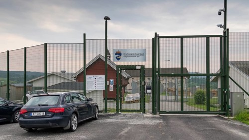Locked entrance with fence and Tor tor to a prison, near Eidsvoll, Norway