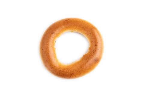 Homemade Ring Bagel isolated on white background. top view, flat lay, close up
