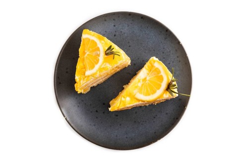 Lemon cake isolated on white background, top view, flat lay, close up