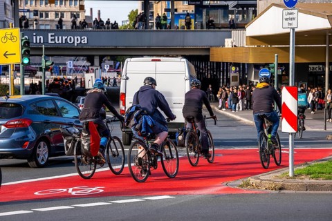 Cycle path, cycle lane, marked in red to draw the attention of motorists to the cycle path, between