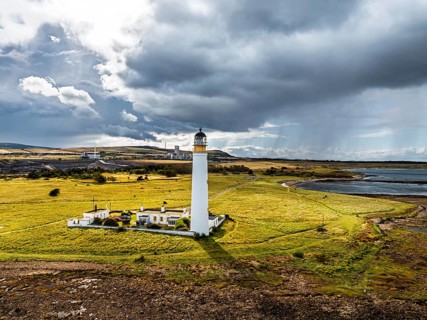 Rain Clouds over Barns Ness Lighthouse from a drone, Dunbar, East Lothian, Scotland, UK