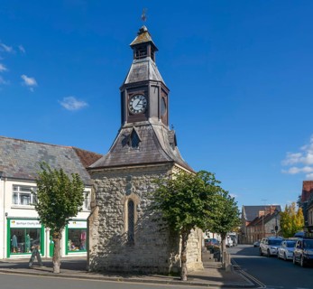 Historic Clock Tower building in the Market Place, Mere, Wiltshire, England, UK