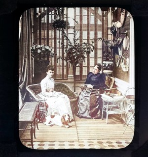 A colourised magic lantern slide of Queen Mary, when Princess May of Teck, with her mother, the