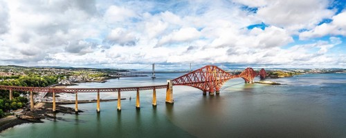 Panorama of Forth Bridge from a drone, Queensferry Crossing, Forth Estuary, Scotland, United