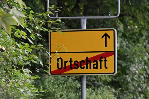 Instead of the usual place name sign, a replacement place name sign has been installed in the