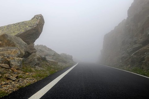Fog on pass road Alpine pass Colle del Col de Nivolet, Gran Paradiso National Park, Ceresole Reale,