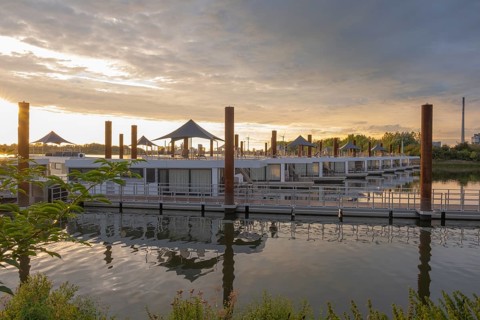 View of house messengers at Lankenauer Höft at Neustadt harbour in the evening light, Weser,