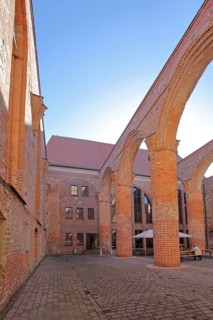 Interior view of the St Bartholomäi church ruins, view upwards, open, archways, columns, pillars,
