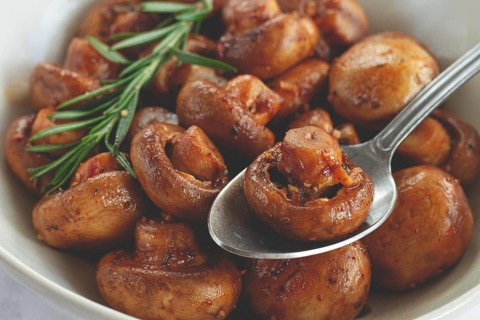 Fried mushrooms, with spices, in soy sauce, vegetarian food, homemade, no people
