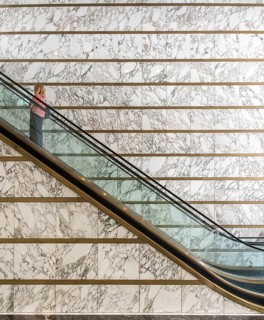 Escalator in the foyer of the Meoclinic, private practices in Friedrichstraße, Berlin, Germany