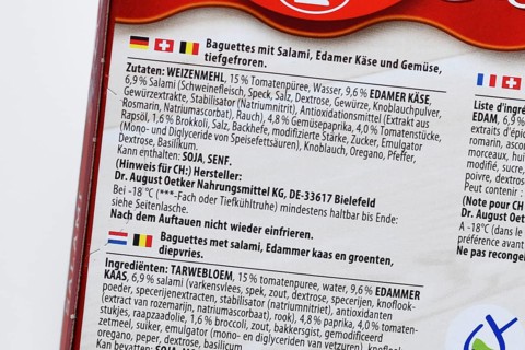 Germany - September 2025: Ingredient list in German on frozen salami baguette packaging