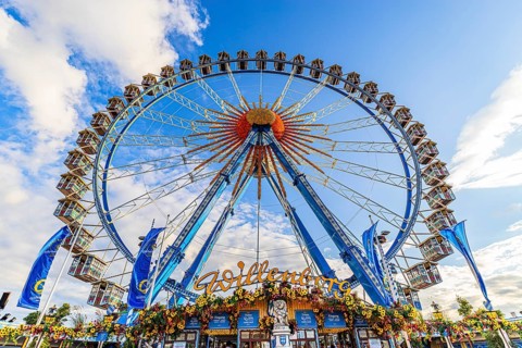 Ferris wheel in front of a white-blue sky, Festwiese, Theresienwiese, Oktoberfest, Munich, Upper