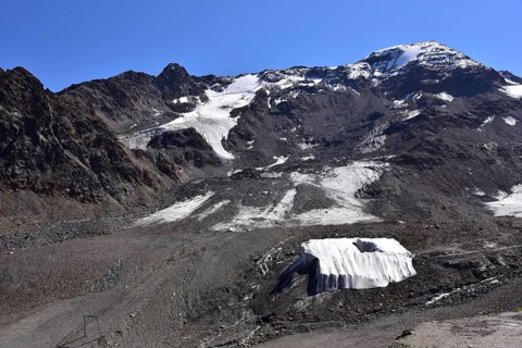 Weißseespitze (3532 m) in the foreground the covered accessible crevasse on the Kaunertal Glacier,