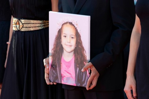 Venice, Italy - 3 September 2025: Motaz Malhees with a portrait of five-year-old Palestinian girl